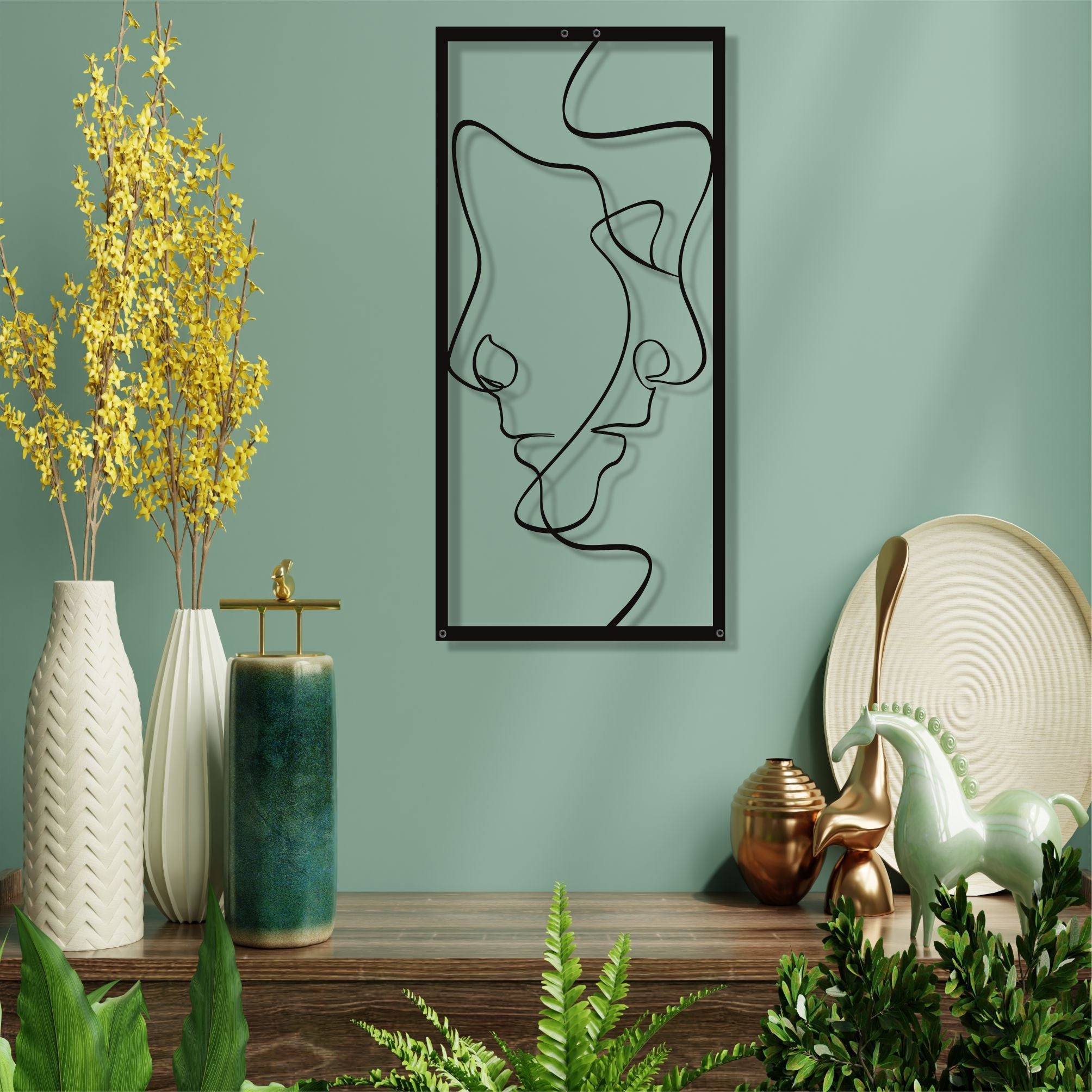 Two Faces Metal Wall Decoration In A Frame
