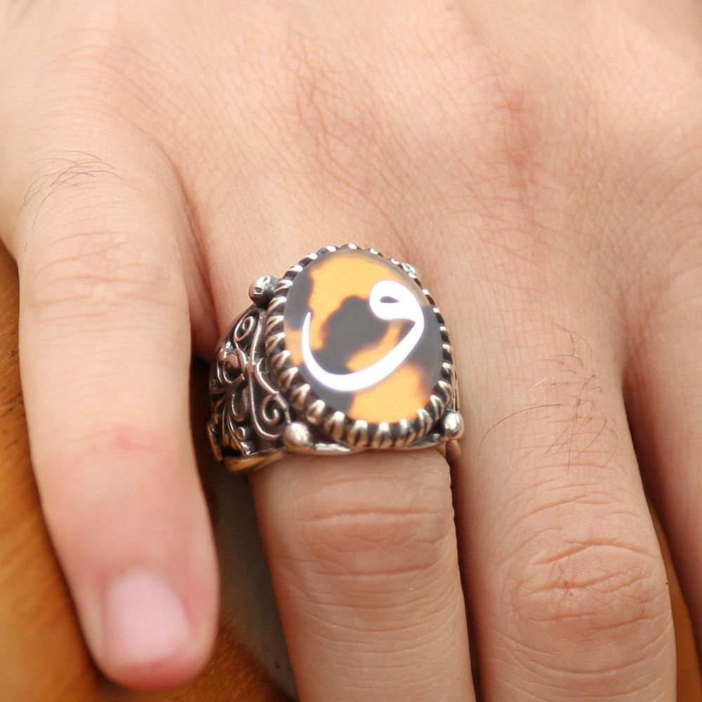 Silver Ring with Mother-of-Pearl Inlay on Tortoiseshell"و"Motif