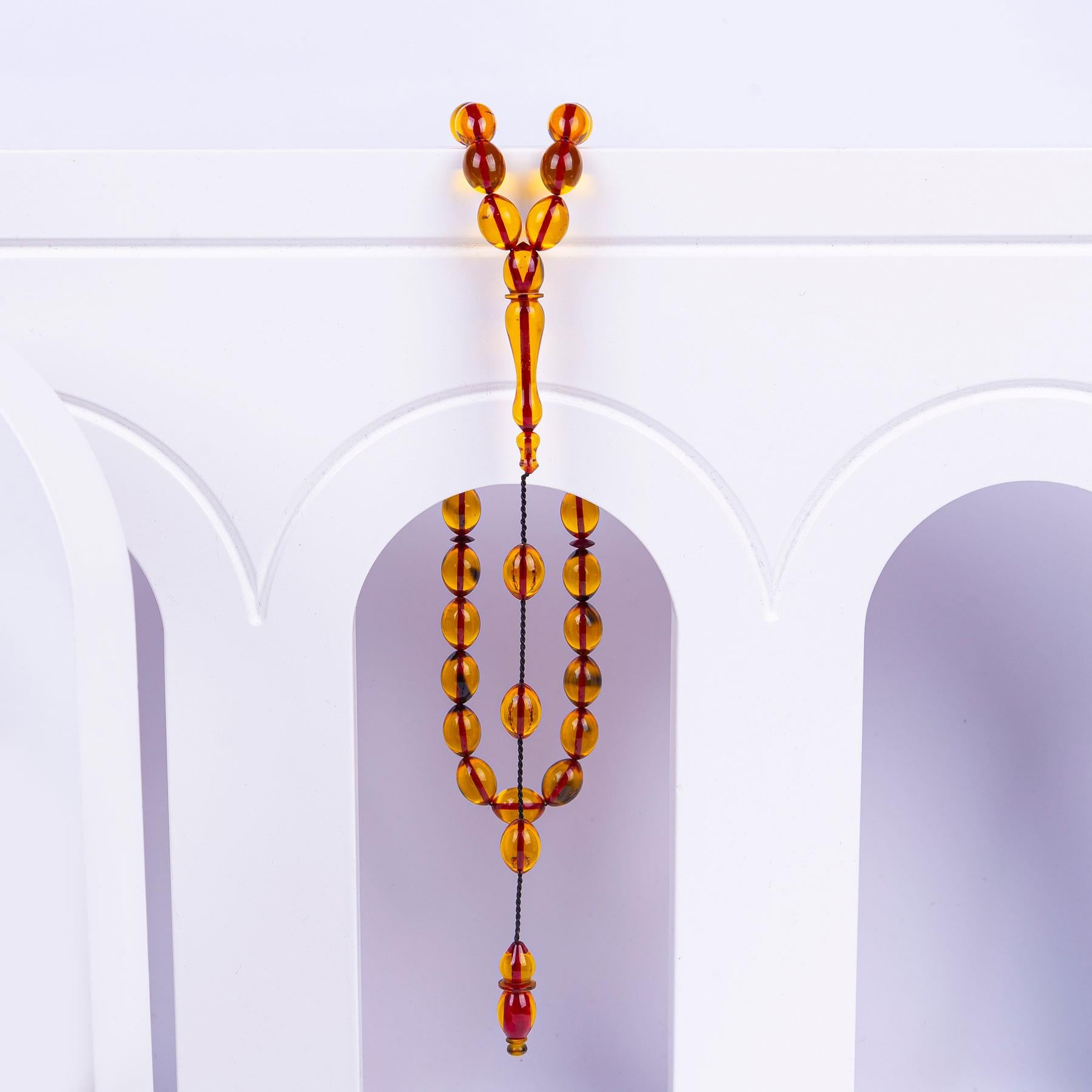 Systematic Solid Cut Fire Amber Rosary
