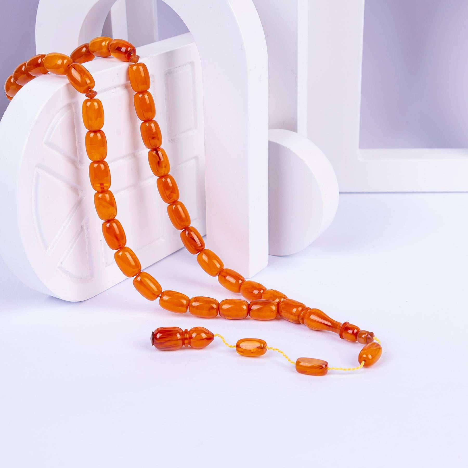 Systematic Capsule Cut and Pressed Amber Prayer Beads 1
